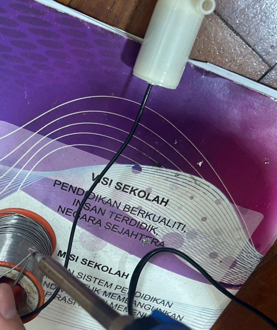 Figure 17: Me Soldering at Home