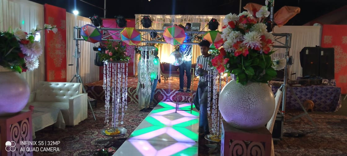 Ramp, pots, umbrellas, stage , sofas