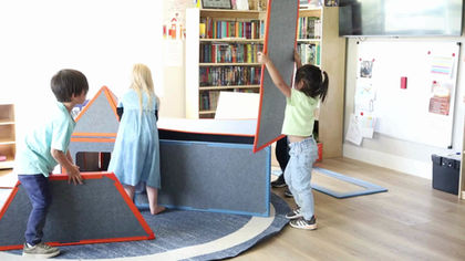 Students building together using Superspace in a collaborative classroom setting