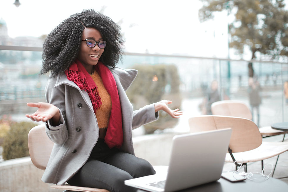 girl-sitting-in-front-of-laptop-expressive-and-happy