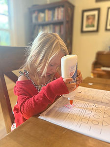 preschooler gluing