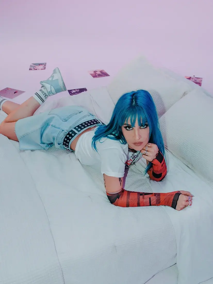 Charlotte Sands posing for music video