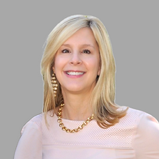 A headshot of Cypress Planning Group co-founder and owner, Ashley McCoy