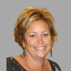 A headshot of Cypress Planning Group meeting contractor Kim Koteff