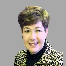 A headshot of Cypress Planning Group meeting contractor Laurie Hawes