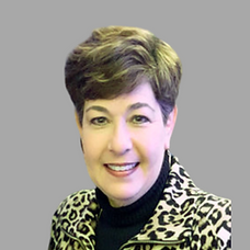 A headshot of Cypress Planning Group meeting contractor Laurie Hawes