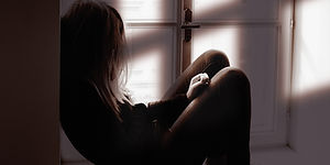 Woman Sitting Thoughtfully_edited.jpg