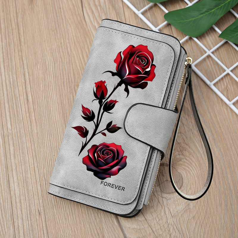 Thumbnail: Embossed Rose Leather Clutch: Romantic & Timeless Luxury
