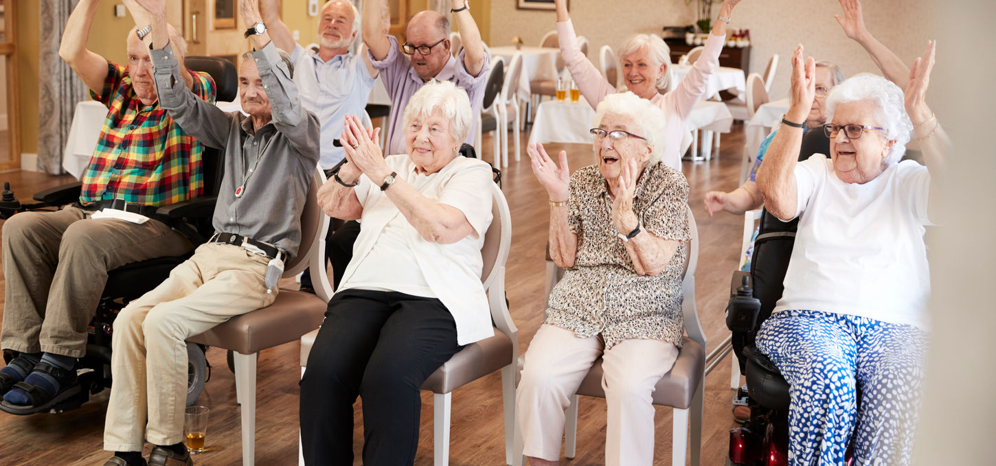 Group-Of-Seniors-Enjoying-Fitness-Class-In-Retirement-Home-1047537292_5360x3574.jpeg