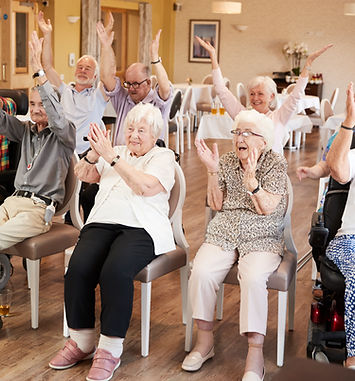 Group-Of-Seniors-Enjoying-Fitness-Class-In-Retirement-Home-1047537292_5360x3574.jpeg