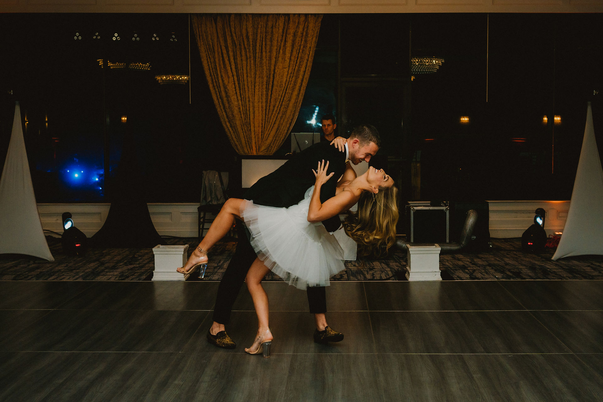 bride and groom practicing their first dance before guests arrive