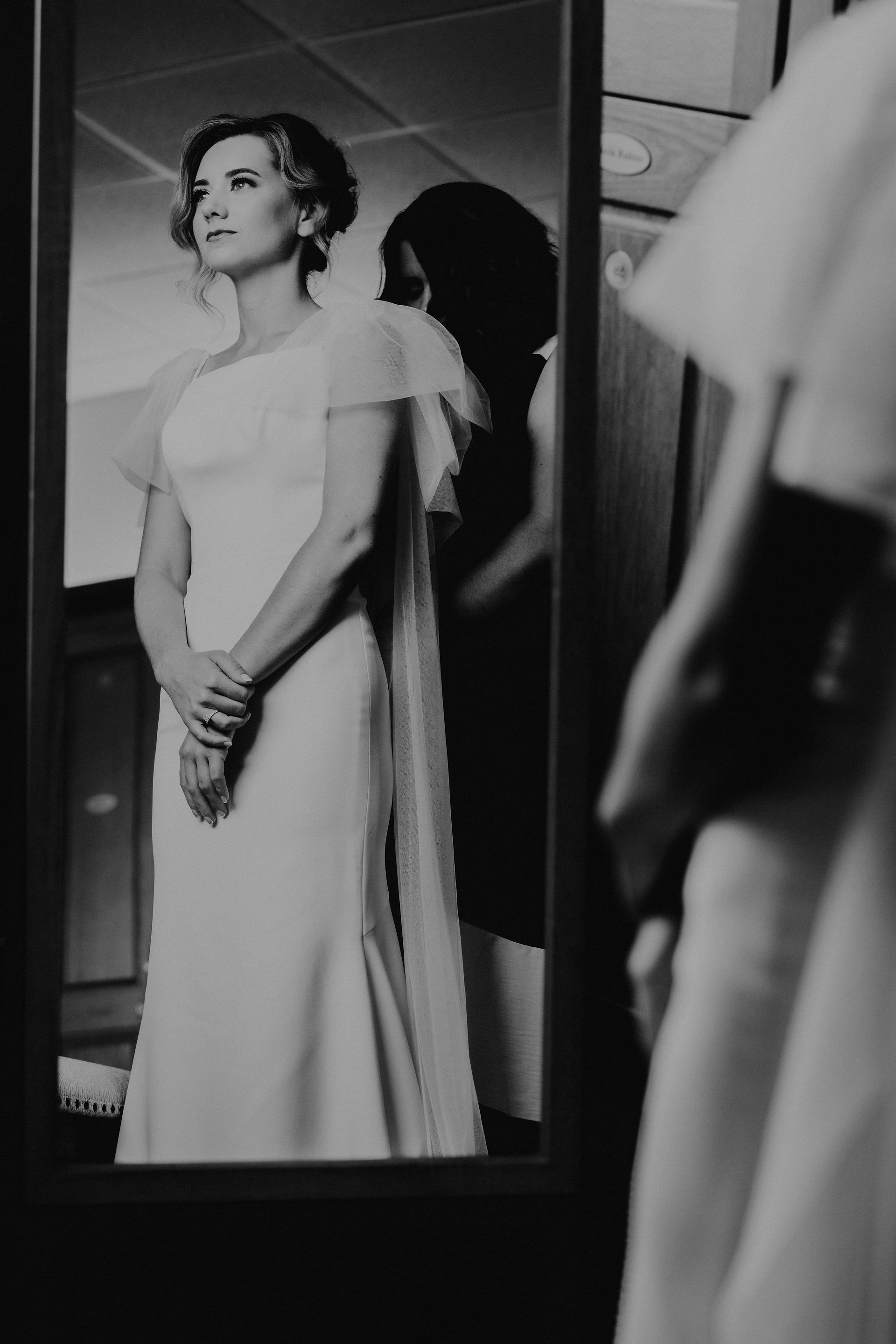 black and white wedding photography, bride getting ready 