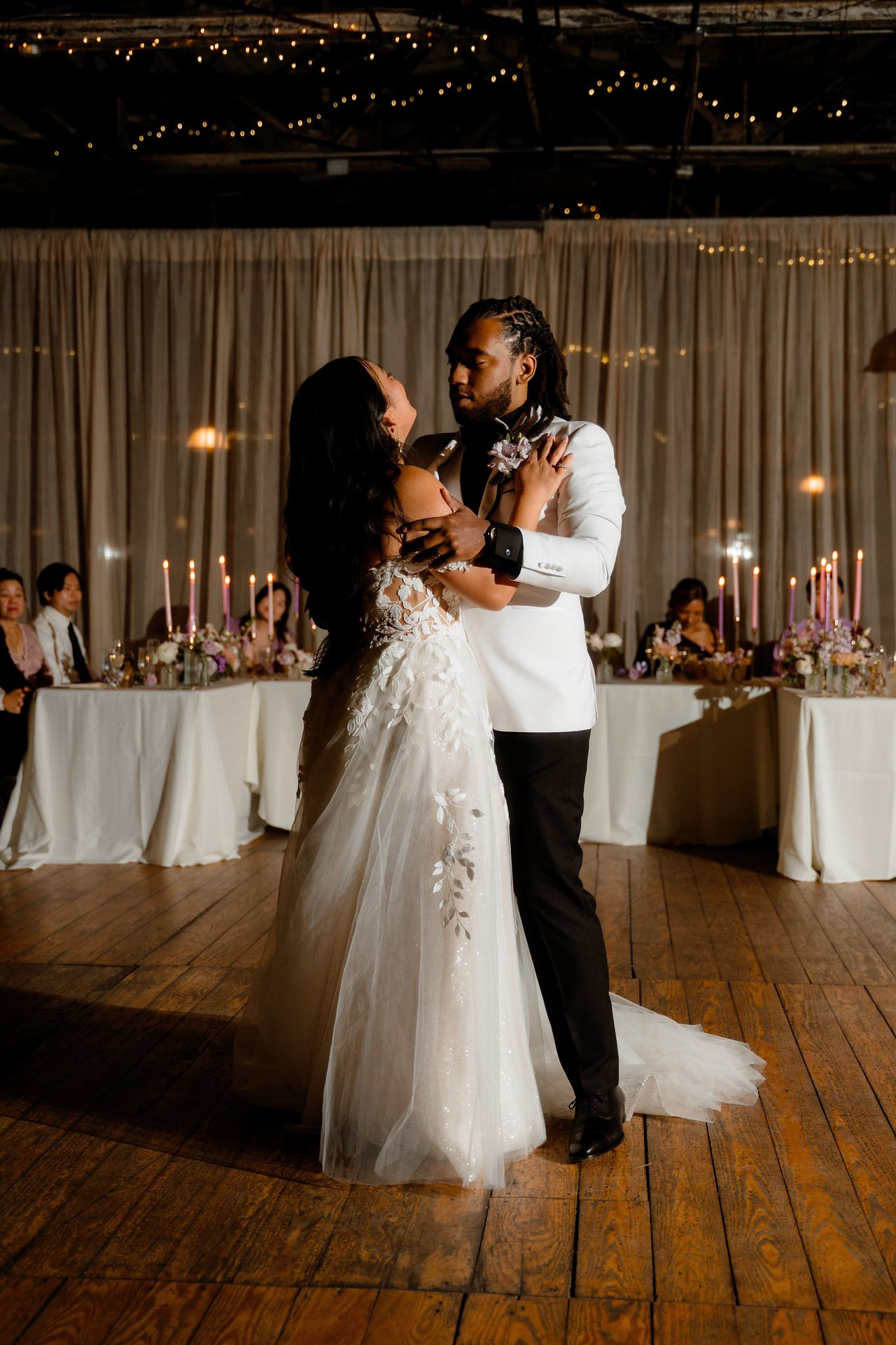 A bride and groom dancing at their wedding at The Lace Factory in Connecticut.