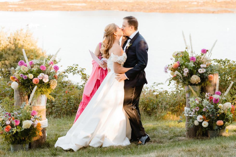 wedding ceremony photo on the oceanfront lawn at grey havens inn in georgetown, maine