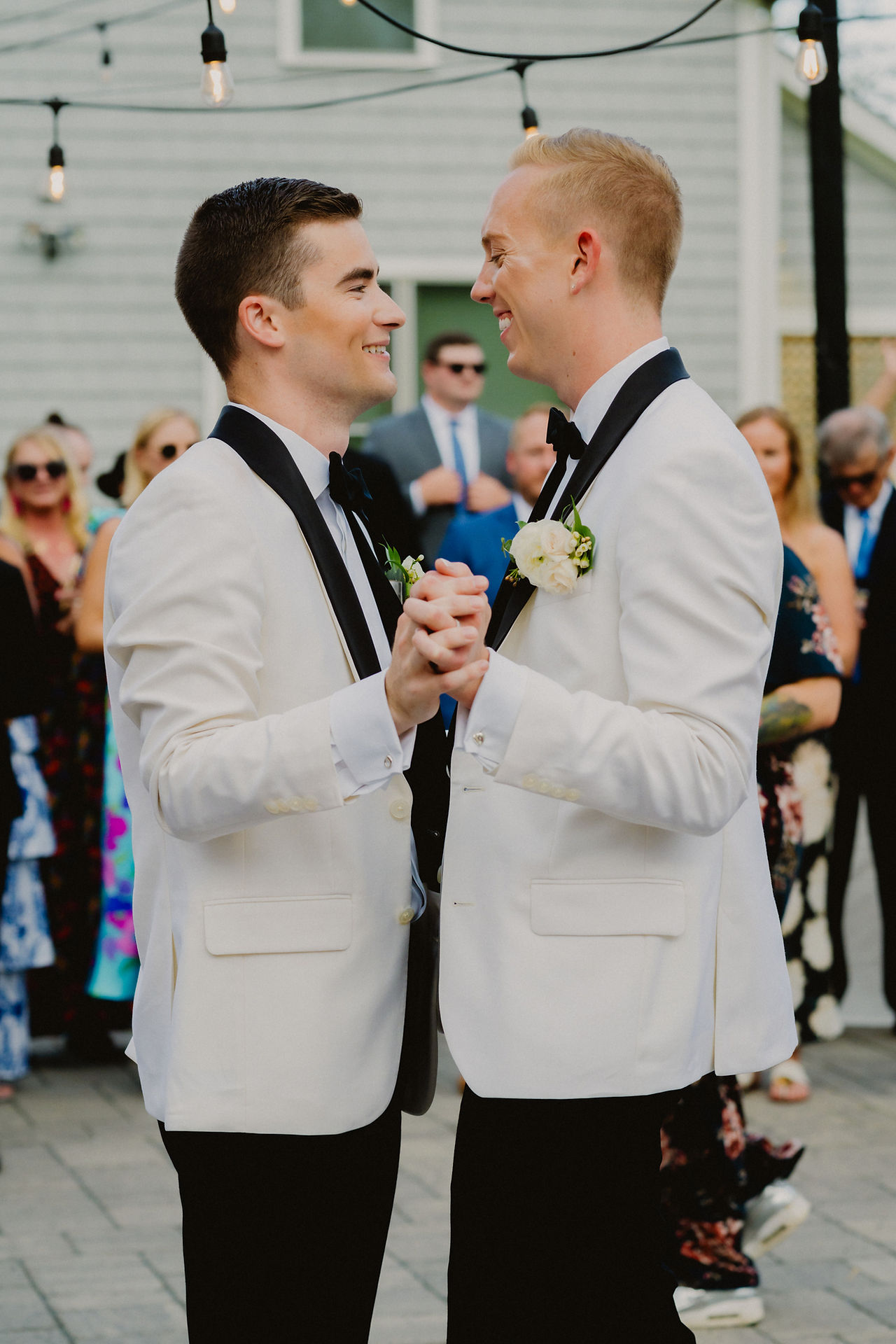 gay grooms first dance at wedding reception at Autumn Lane Estate in Sebago, Maine
