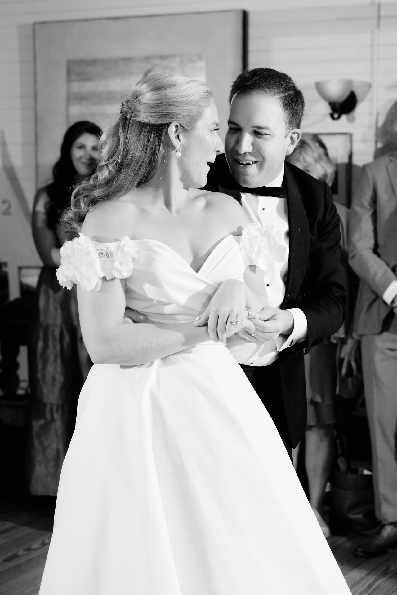 candid wedding photo of bride and groom from the reception dance floor at grey havens inn in georgetown, maine