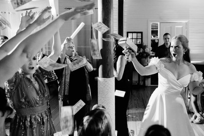 photojournalistic photo of bride partying on the dance floor at grey havens inn in georgetown, maine