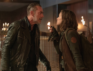 Lauren Cohan as Maggie and Jeffrey Dean Morgan as Negan stand by a brick wall in an alley in a scene from The Walking Dead: Dead City
