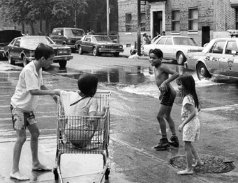 Image of kids playing with a shopping cart in The Bronx: Courtesy of Bronx County Historical Society-Summertime Mott Haven 1989: Courtesy Edwin Pagán