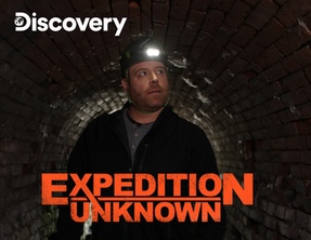 Image Host Josh Gates explore a tunnel in Poland as he searches for evidence of the Amerikabomber