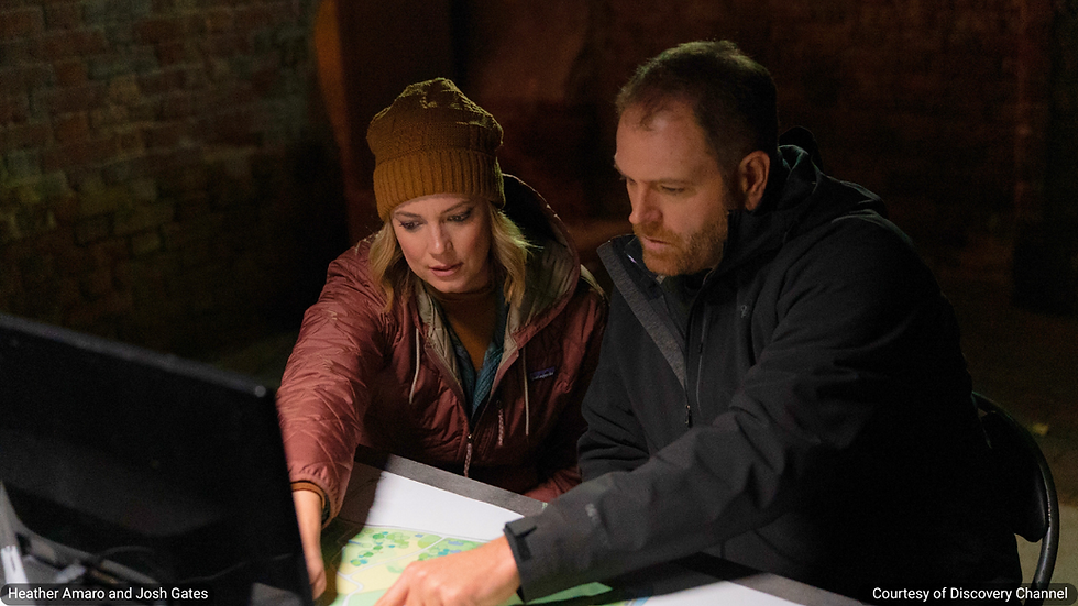 Image of Heather Amaro and Josh Gates discussing a game plan for their investigation of Ireland's Spike Island-ExpeditionX-August2025