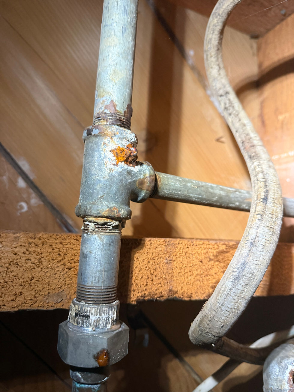 Galvanized pipe with corrosion.