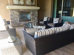 outdoor-furniture-and-a-fireplace-on-a-patio-2025-01-10-15-14-26-utc-(1).jpg