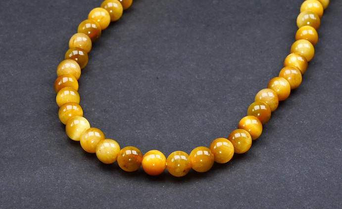 Goldenes Tigerauge Armband – klassischer Schutzstein für Mut, Fokus und innere Stärke, Nufera Edelsteinschmuck Schweiz