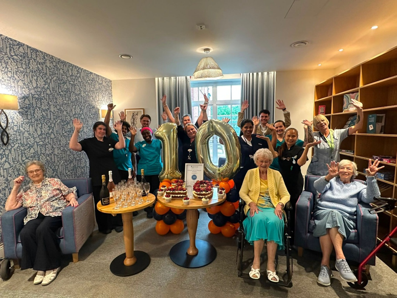 Haddenham Team Members celebrating 10/10 on Carehome.co.uk!