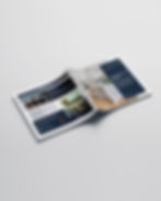 Open branding booklet showcasing JCreate Digital Agency design portfolio