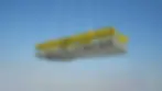 Underwater view of a Reno mattress geotextile being lowered and positioned on the ocean floor for marine erosion control.