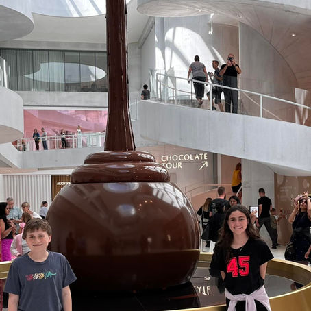 kids with giant chocolate fountain
