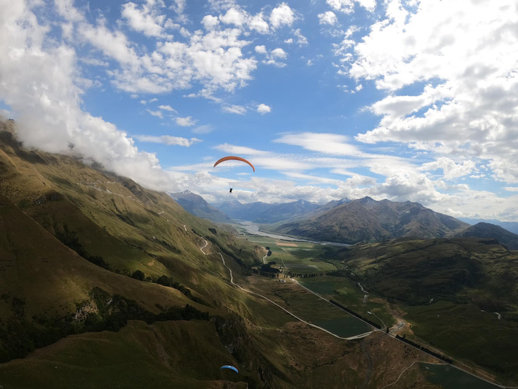 paraglider over mountain