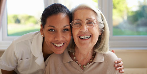 Happy nurse and Elderly Patient smiling