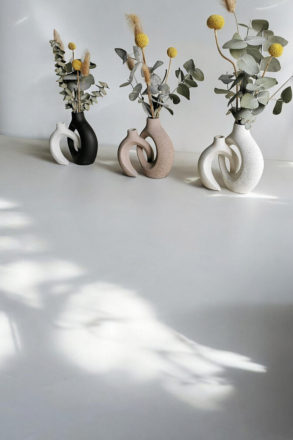 Miniatura: Floreros entrelazos