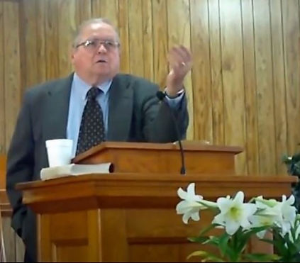 Dad preaching.