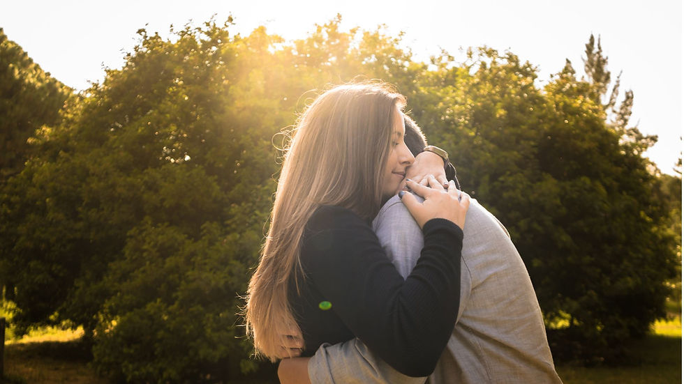 Two people embracing in a supportive hug