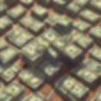 Stack of money on a table for executor compensation in Ontario.