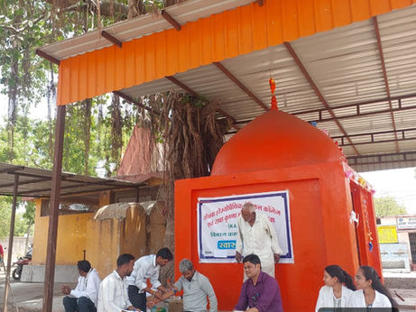 VILLAGE CDAMP DURING HOMOEOPATHIC WEEK