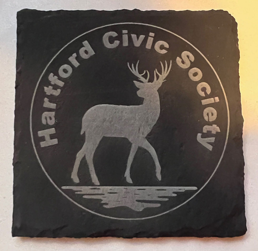 A square drinks coaster, made of dark grey slate, engraved with the Hartford Civic Society logo