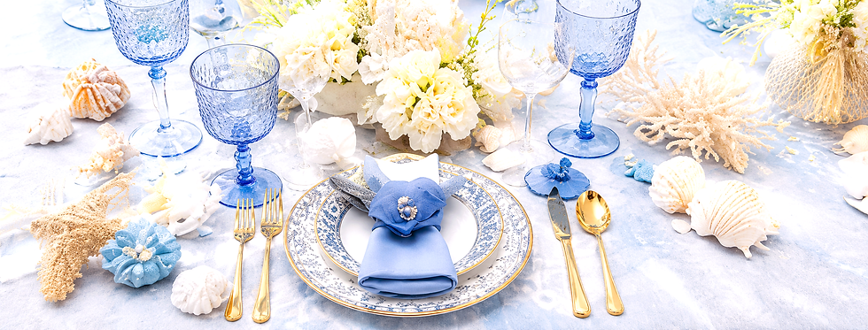 Elegant ocean blue wedding palette featuring coastal inspired shades of navy, aqua, turquoise, and soft beach tones for a luxury tropical destination wedding theme.