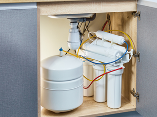 Under-sink reverse osmosis water filtration system installed by professional plumbers in Colorado Springs for clean, safe drinking water