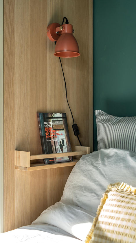 a book on a wooden shelf titled henrietta pergole