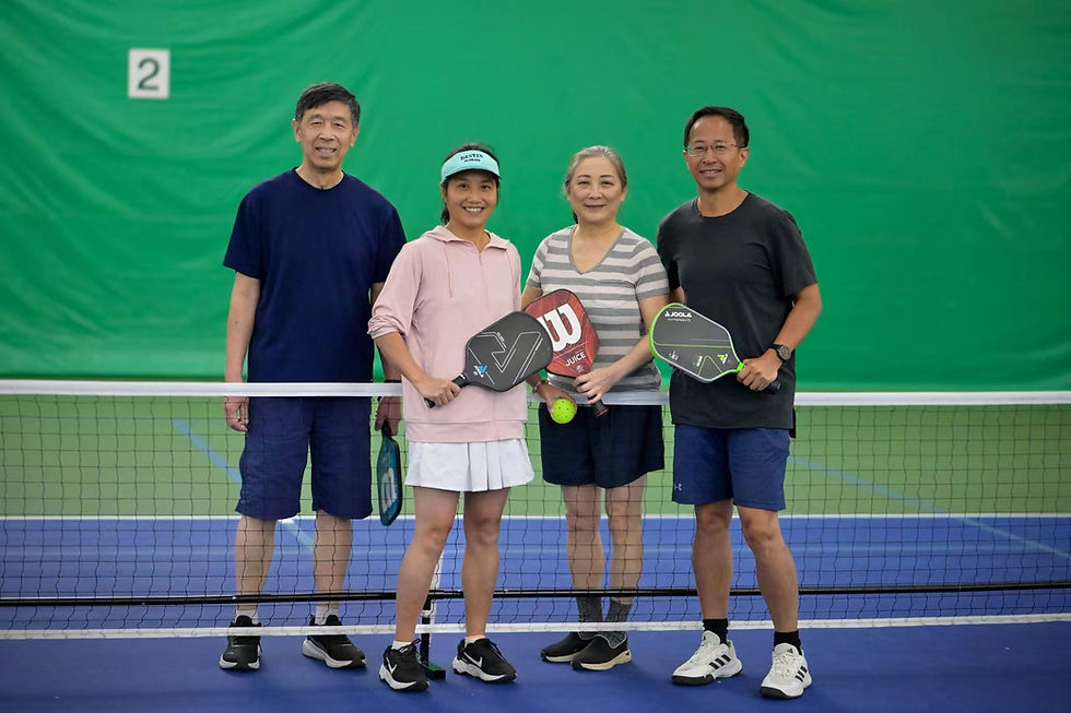 The Pans and The Lius smiling and posing at the 2025 CCACC Health Charity Pickleball Cup.