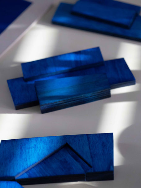 Custom-designed wall piece in cobalt blue tones, crafted from wood by Studio RENS – showcasing bold color application and refined materiality