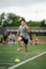 Child participating in an adaptive sports program, focusing on balance and coordination.