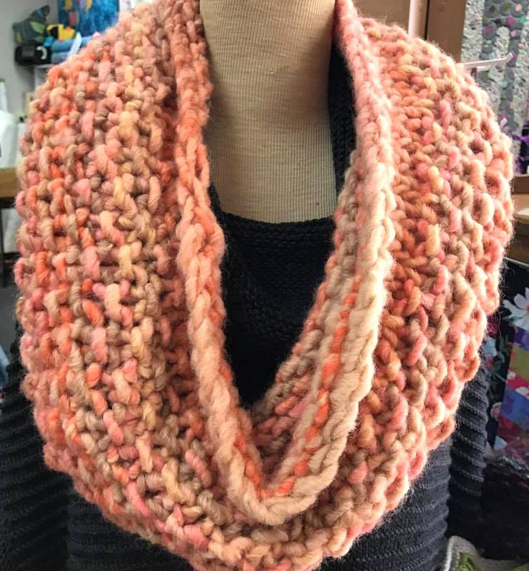 Knitted Gigante Cowl displayed on mannequin