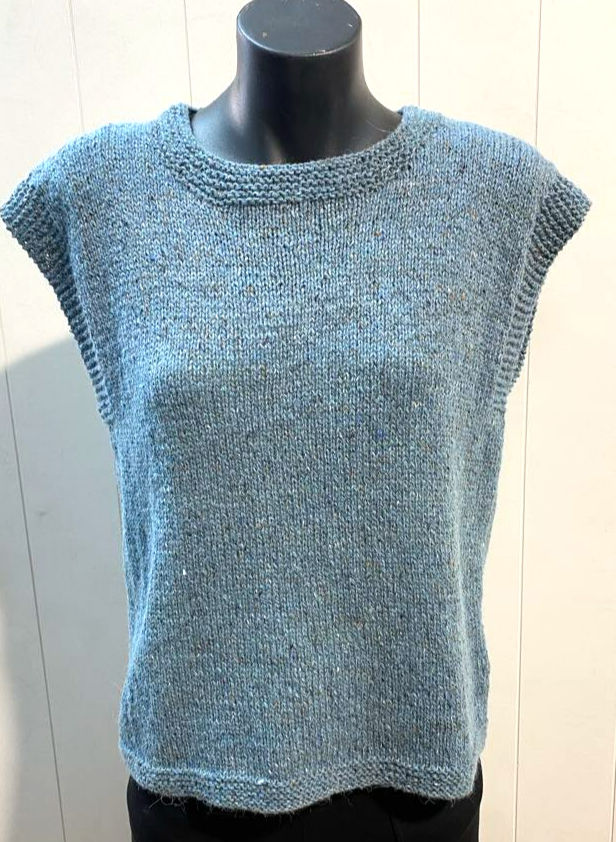 Cosy 8ply Vest in Rowan Felted Tweed Colour Blue displayed on manequin