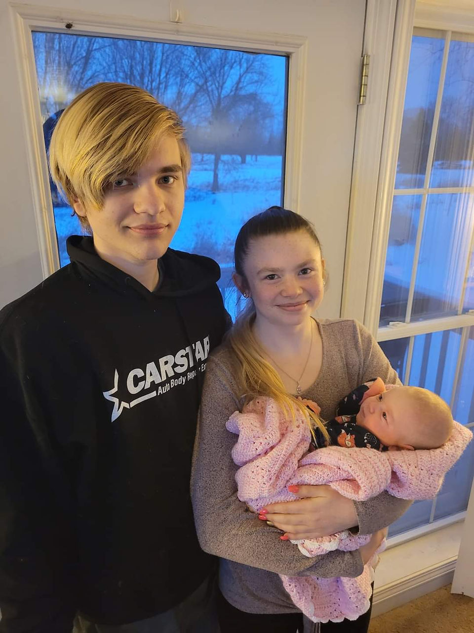 Westley, fiancee, and their daughter