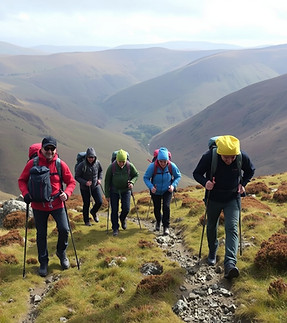 small group walking in the brecon beacons wearing technical kit.jpg
